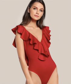 This sexy but sweet bodysuit is perfection. Featuring a a ruffled trim collar with a plunging v-neckline, an open back and a sleeveless fitted form. This bodysuit pairs perfectly with pants, jeans, skirts, shorts or leggings. Made with a nylon and spandex blend for comfort and style while hugging your every curve. Comes in two fabulous collars from which to choose. Silk Bodysuit, Basic Bodysuit, Backless Bodysuit, Red Bodysuit, Bodysuit Blouse, Ruffle Bodysuit, Women's Button Down Shirt, Leotards Ballet, Fashion Buyer