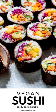 several sushi rolls with different toppings on them and the words vegan sushi