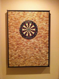 a dart board mounted to the side of a wall