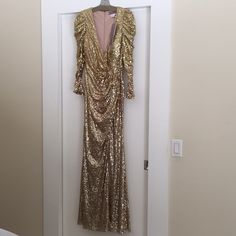 Top To Bottom Gold Sequin, V-Neck, Puffy Sleeve, Zipper Up The Back, Never Worn Gold Gown. Sequin Design Slightly Ombr Gold V-neck Evening Dress, Glamorous V-neck Cocktail Gown, Elegant Gold V-neck Gown, Holiday V-neck Formal Gown, Elegant V-neck Gown For Dinner, Elegant V-neck Dinner Gown, Evening Gown With Sequins And V-neck, Gold V-neck Evening Dress For Cocktail, V-neck Gala Evening Gown