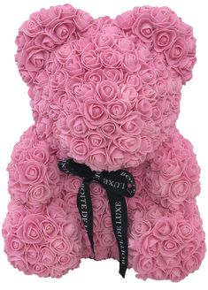 a pink teddy bear made out of roses