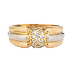 Vintage Cartier diamond ring crafted in 18 karat yellow, rose & white gold (circa 1980s to 1990s). 17 round brilliant cut diamonds total an estimated 0.34 carats (estimated at G-H color and VS1-2 clarity). The out of production Cartier ring features a tri-colored band with diamonds set to the center of a low dome mount. The ring is great worn alone or layered with your fine jewelry from any era. The ring is in very good condition. No box or papers. Particulars: Weight: 5.3 grams Stones: 17 round Cartier Diamond Ring, Cartier Diamond Rings, Cartier Diamond, Gold Sign, Ring Crafts, Wedding Band Sets, Cartier Ring, Fine Jewellery, Round Brilliant Cut Diamond