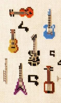 a cross stitch pattern with musical instruments on the front and back side, all in different colors