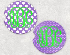 two purple and green polka dot coasters with the word monogrammed on them