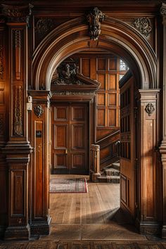 an open door leading into a large wooden room with carved wood paneling and ornate carvings on the walls