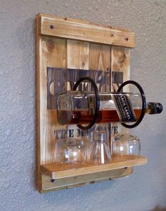 a bottle rack with glasses on it