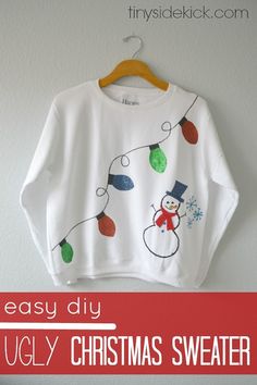 The shirt green. http://www.fashionnewswebsites.com/category/xmas-sweater/ 10 DIY Ugly Christmas Sweaters for the Holidays - thegoodstuff Easy Ugly Christmas Sweater, Diy Christmas Outfit, Diy Christmas Shirts, Ugly Holiday Sweater, Tacky Christmas