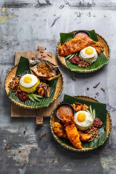 three plates filled with different types of food