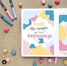 an open notebook with the words trust the magic of new beginnings written on it surrounded by stars and confetti