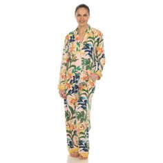 Our Two-Piece Wildflower Print Pajama Set includes a long-sleeve notch collar top and coordinating full pajama bottoms. The top button-down front and the full pajama bottoms a full elastic waistband with adjustable drawstring. You can easily slip into it and stay snug all night long. The vivid and eye-catching wildflower print is a visual treat, adding a pop of color to your evening routine. Not only are these pajamas beautiful, but they are also incredibly soft and warm. Long Sleeve Floral Print Sleepwear For Lounging, Floral Print Long Sleeve Sleepwear For Lounging, Floral Print Long Sleeve Sleepwear For Vacation, Printed Long Sleeve Sleepwear For Vacation, Women’s Pajamas, Fancy Pjs, Floral Pajama Pants, Wildflower Print, Pj Party