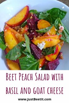 beet peach salad with basil and goat cheese in a white bowl on a wooden table