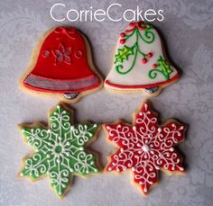 three decorated christmas cookies sitting next to each other on a white tablecloth with the words cookie cakes written below it