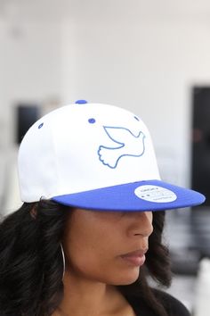 With unique designs you won't find anywhere else, our caps are the quality type that are designed with a thicker woven fabric. Not those flimsy weak ones that lose shape. 6-Panel. 100% stitched embroidered design. Flat brim. Dry clean only. Comes in: Snapback and FlexFit. Perfect for those Finer Women who need a cap for all casual, sports and/or fitness occasions. White Adjustable Fitted Hat For Hip Hop, White Hip Hop Snapback Hat With Curved Bill, White Snapback Hat For Streetwear, White Snapback Hip Hop Baseball Cap, White 5-panel Hip Hop Baseball Cap, White Hip Hop Snapback Hat, White Flat Bill Snapback For Streetwear, Finer Womanhood, Dove Of Peace