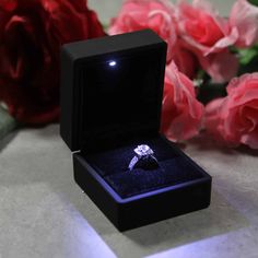 black ring box with led lighting, proposal ring box with light, engagement ring box with roses, luxury engagement ring box, ring box for night proposal Wedding Rings In Box Beautiful, Engagement Rings In Boxes, Ring For Proposal, Proposal Ring Box Ideas, Wedding Ring In Box, Engagement Ring Box Ideas, Engagement Rings Box, Ring Box Design, Matte Black Wedding