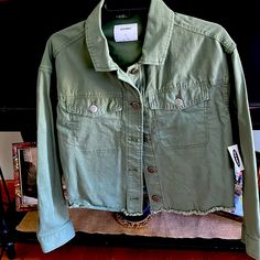 Brand New Never Worn Army Style Jean Jacket Casual Cropped Outerwear With Pockets, Casual Cropped Outerwear For Fall, Casual Khaki Cropped Jacket With Pockets, Casual Green Utility Jacket For Fall, Casual Green Cropped Jacket With Pockets, Casual Long Sleeve Cropped Jacket For Day Out, Green Button-up Outerwear For Day Out, Casual Cropped Outerwear With Button Closure, Casual Cotton Cropped Jacket For Day Out