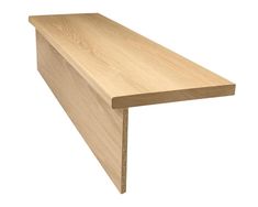 a close up of a wooden shelf on a white background