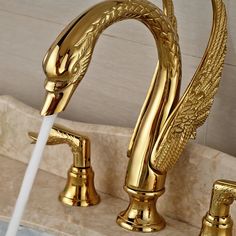 a golden faucet with water running from it