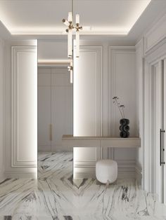 a room with marble floors and white walls