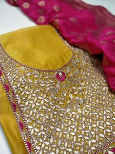 Item Overview ATHARVA Hand Embroidery Salwar Kameez/Embroidery Neck Yellow/Banarsi Silk Dupatta/Custom Stitch/Tunic/Patiala/Churridar/Anarkali Dno. CH1510 Fabric: * Shirt - Chanderi Silk- Hand Embroidered Neck - Yellow- 2.5 Mts - Beautiful Hand Embroidery * Dupatta: Chiffon Chinnon Dupatta- All over Embroidery - 2.5 Mts- Latkans Tassels - Dark Pink * Bottom Santoon Silk 2.5 Mts. Excusive Hand Embroidered Party Wear Punjabi Suit. Customization: * Fabrics Customization: Designs Can be made in diff Gold Salwar Kameez With Resham Embroidery For Eid, Designer Embroidered Gold Salwar Kameez, Embroidered Kundan Anarkali Traditional Wear, Eid Gold Embroidered Salwar Kameez, Yellow Raw Silk Salwar Kameez With Mirror Work, Straight Kurta Salwar Kameez With Gota Work, Straight Kurta Salwar Kameez With Gota Work In Chinon, Transitional Semi-stitched Salwar Kameez With Gota Work, Semi-stitched Embroidered Gold Anarkali Set