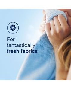 a woman covering her face with a blue towel and the words for fantastically fresh fabrics