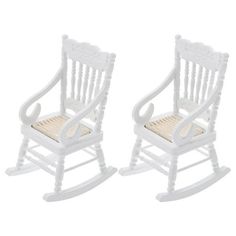 two white rocking chairs with wicker seats