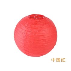 a red paper lantern is shown on a white background with chinese characters in the bottom right corner