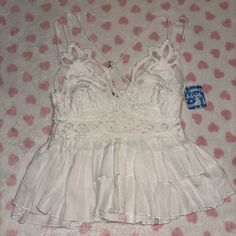 Free People Adella Cami White Lace Ruffle Size Small New With Tag $68 Retail White Top With Ruffled Hem And Straps, Casual Lace Top With Ruffles, Casual Lace Tops With Ruffles, Lace Tops With Ruffles For Vacation, White Tops With Lace Trim And Ruffled Straps, Free People Adella, White Cami, Lace Ruffle, Shopping List