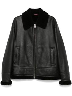 black leather faux-shearling trim front zip-fastening pocket spread collar drop shoulder long sleeves two front welt pockets belted waist tabs debossed logo to the rear faux-shearling lining straight hem We've partnered with Good On You — an independent agency that rates how brands perform in relation to their impact on the planet, people and animals, with a multi-criteria rating simplified to a five points scale. In order to be awarded our conscious label, larger brands need to score a minimum of four out of five ('Good'), while smaller brands must score at least three out of five ('It's A Start'). This item comes from a brand rated three out of five ('It's A Start') by Good on You at the time it was added on FARFETCH. Please note, this is a brand-level rating and does not guarantee that Gucci Winter Outerwear With Pockets, Gucci Winter Outerwear With Padded Collar, Gucci Luxury Outerwear With Padded Collar, Black Shearling Leather Jacket With Zipper, Black Shearling Leather Jacket With Zipper Closure, Classic Black Gucci Outerwear, Gucci Luxury Leather Jacket For Winter, Black Shearling Leather Jacket, Gucci Leather Jacket