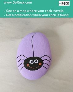 a purple rock with a spider painted on it's face and the caption says, see on a map where your rock travels - get a notification when your rock is found