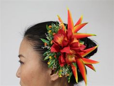 a woman with a flower in her hair