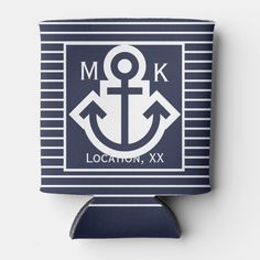 a blue and white can cooler with an anchor in the center on it's side