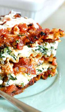 a close up of a plate of food with broccoli and cheese on it