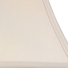 a close up of a lamp shade on a white background