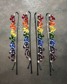 These elegant beaded twist rainbow hair pins are perfect for anyone who is celebrating LGBT pride month, or anyone who just loves rainbows! The rainbow of faceted rondelle beads creates a beautiful piece of hair jewelry for any hair length. The bobby pins are approx. 2 inches long. Use the drop down menu to choose how many hair pins you would like to purchase. The more you buy, the more you save! Also check out my matching rainbow ear climbers and make it a super colorful set! https://www.etsy.c Rainbow Beaded Jewelry, Pride Jewelry Diy, Pride Crafts, Pride Hair, Hair Jewelry For Braids, Pride Jewelry, Dreadlock Jewelry, Braid Accessories, Diy Hair Accessories Ribbon