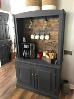 the coffee bar is made out of an old cabinet