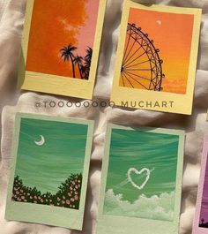 four cards with pictures of ferris wheel and palm trees on them, one has a heart in the middle