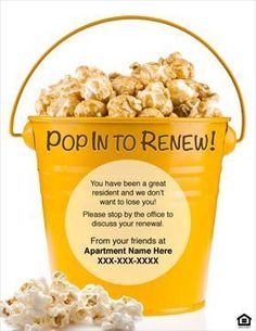 a bucket full of popcorn with the words popin'in to renewal on it