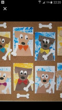 paper cut out of dogs and bones on a bulletin board