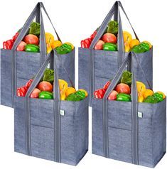 three bags filled with fruits and vegetables on top of each other in front of a white background