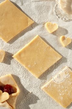 the dough has been shaped into hearts and is ready to be baked