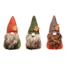 three gnomes with different colored hats on their heads