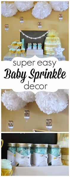 baby sprinkle decorations are hanging from the ceiling and on display in mason jars