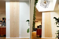 the vertical blinds in this room are made out of wood and have decorative designs on them