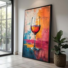 a painting with a glass of red wine on it next to a potted plant