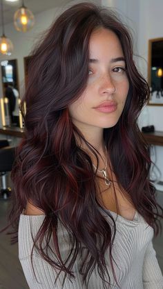 25 Dark Brown Hair Inspirations for a Chic Transformation Dark Hair With Cherry Highlights, Brunette Hair Burgundy Highlights, Burgundy Hair On Tan Skin, Dark Brown Hair With Reddish Highlights, Dark Cherry Highlights On Brown Hair, Dark Hair With Burgundy Highlights Fall, Dark Brown And Red Highlights, Brown Hair Dark Red Highlights, Dark Brown Hair With Maroon Highlights