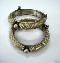 Vintage antique tribal old silver bangle bracelet pair from Rajasthan (India). great handmade gajre design, good worn piece good for jewelry collection.Note - Please check pictures carefully for more detail. Inner diameter - 5.6 cm(2.2 inch) Inner circumference - 17.5 cm(6.9 inch) width max. - 1.4 cmweight for pair - 101 gramsmaterial - Silver and original old worn pair. Mantra Bracelet, Silver Bangle Bracelet, Silver Jewelry Earrings, Rajasthan India, Message Jewelry, Silver Bangle Bracelets, Silver Bangle, Traditional Jewelry, Stunning Necklace