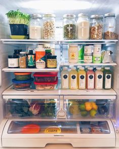 an open refrigerator filled with lots of food