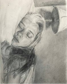 a pencil drawing of a woman with her eyes closed and head tilted to the side