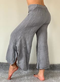 "Soft Wide Leg Style Lady Pants with elastic waistband. Mat 'l : CottonGauze Measurement: Waist: 28\" - 34\" (Max. stretch) Hip: up to 42\" Length: 37\" Inseam: 26\" ❤️ PAYMENT We accept payments via PayPal only. ❤️❤️ Delivery Time : USA only 2business days Canada: 2- 3 business days France: 2- 3 business days Germany 2- 3 business days North America: 2- 3 business days Europe: 2- 3 business days Australia, New Zealand and Oceania: 2 business days Asia Pacific: 1-2 business days Latin America an Comfortable Stretch Wide Leg Trousers, Flowy Wide Leg Loungewear Bottoms, Flowy Wide-leg Loungewear Bottoms, Flowy Wide Leg Bottoms For Loungewear, Flowy Long Pants For Loungewear, Spring Wide Leg Yoga Pants, Ankle-length Wide Leg Pants For Beach, Comfortable Non-stretch Wide Leg Harem Pants, Comfortable Non-stretch Wide-leg Harem Pants