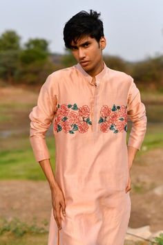 Peach kurta with cutdana embroidery in rose placement pattern. Paired with churidar. - Aza Fashions Traditional Designer Peach Kurta, Peach Embroidered Kurta For Wedding, Traditional Peach Chanderi Kurta, Peach Embroidered Kurta For Diwali, Diwali Peach Embroidered Kurta, Traditional Peach Kurta For Festive Occasions, Peach Embroidered Semi-stitched Kurta, Unstitched Embroidered Peach Traditional Wear, Peach Embroidered Kurta For Eid